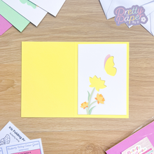 Load image into Gallery viewer, butterfly and flower aperture on yellow card blank