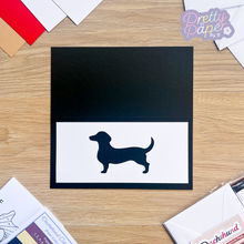 Load image into Gallery viewer, Dachshund Aperture on black card blank
