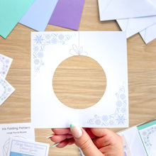 Load image into Gallery viewer, Bauble aperture card with pale blue printed snowflakes