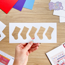 Load image into Gallery viewer, five stockings in a card aperture