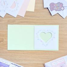 Load image into Gallery viewer, Floral heart aperture on peppermint card