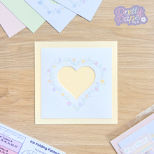 Load image into Gallery viewer, embellished large floral heart aperture on yellow backing card