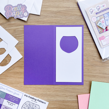 Load image into Gallery viewer, gin glass aperture on purple card