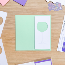 Load image into Gallery viewer, Gin glass aperture with printed stem on jade green card