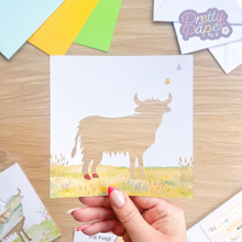 Load image into Gallery viewer, Highland Cow Card Aperture with grassy meadow embellishment