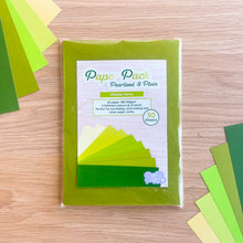 Load image into Gallery viewer, Green paper pack with a label on a wooden surface