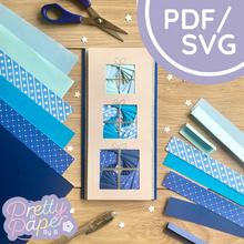 Load image into Gallery viewer, 3 blue iris folding square presents on rectangle card with bow and ribbon peel off embellishments
