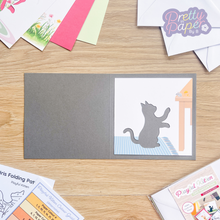 Load image into Gallery viewer, printed kitten aperture on grey card blank