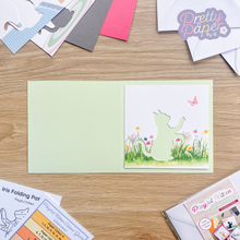Load image into Gallery viewer, printed kitten aperture on green card blank