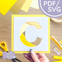 Load image into Gallery viewer, Alphabet letter C in yellow papers folded to create a spiral effect.