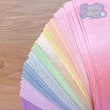 Load image into Gallery viewer, Marshmallow Pastel Paper Pack A5, 60 Sheets | Plain, Sparkle &amp; Pearlised Paper Pad | Salmon, Pink, Yellow, Lilac, Purple, Green, Blue Craft Paper
