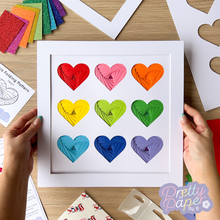 Load image into Gallery viewer, Nine Iris Folding Hearts in bright rainbow colours
