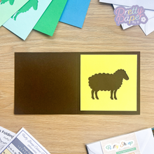 Load image into Gallery viewer, yellow sheep aperture on brown card