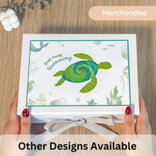 Load image into Gallery viewer, White gift box with turtle design and 'just keep swimming' greeting