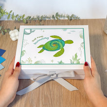 Load image into Gallery viewer, White gift box with sea turtle design and 'Just keep swimming' text