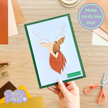 Load image into Gallery viewer, Brown stag head iris fold card with printed antlers on green card blank