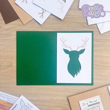 Load image into Gallery viewer, stag head aperture with printed antlers on green card blank