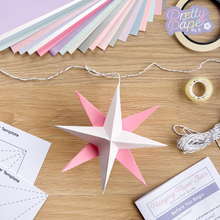 Load image into Gallery viewer, Star and Snowflake Garland | Hanging Paper Stars Kit | Christmas Paper Decorations Kit | Family Craft Activity