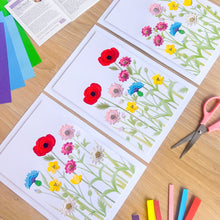 Load image into Gallery viewer, Floral pictures on a wooden surface with colourful paper strips and scissors.