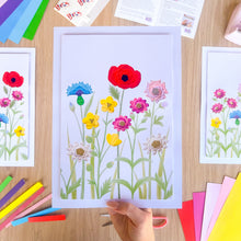 Load image into Gallery viewer, Colourful iris folding flower picture on a wooden surface