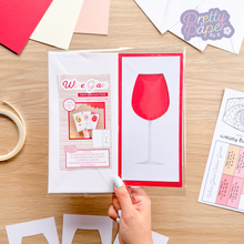 Load image into Gallery viewer, Wine glass card aperture pack embellished with printed stems