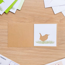 Load image into Gallery viewer, Wren aperture cutout on buff brown card blank
