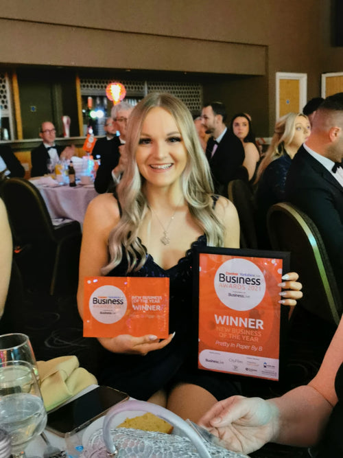 Bethan winning the Examiner Live Business Award for new business of the year 2022