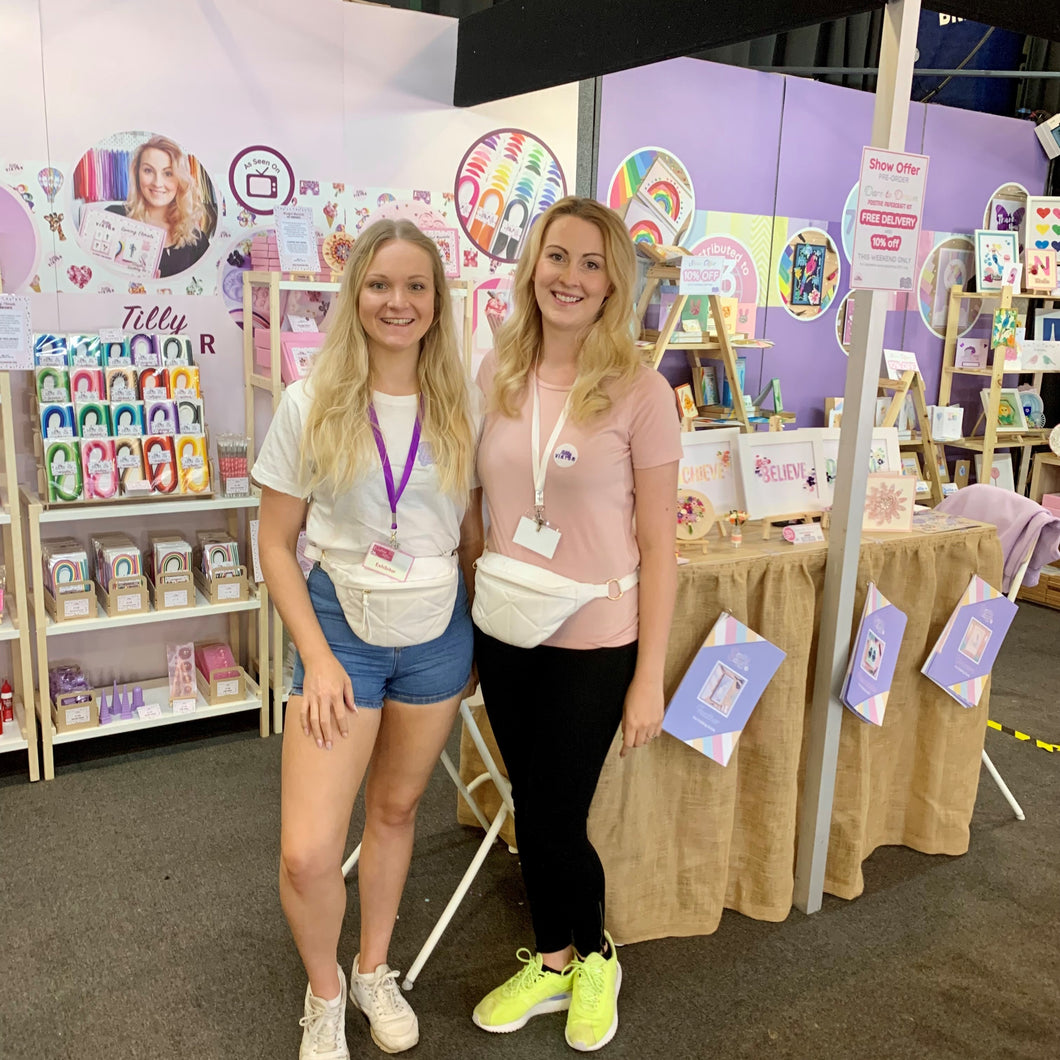 Bethan and Jess in front of their stand