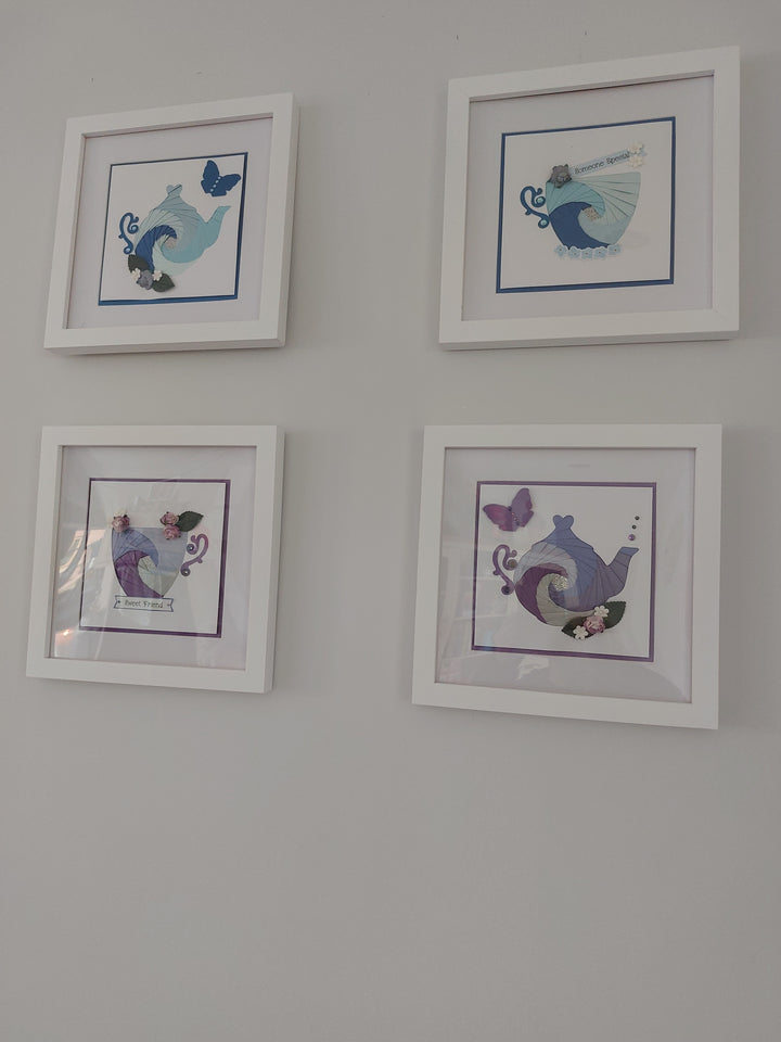 Teapots and Teacups in four frames on a wall