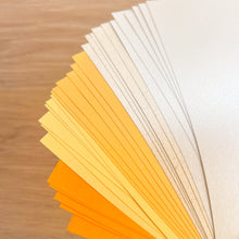 Load image into Gallery viewer, Buttercup Paper Pack A5, 30 Sheets | Plain, Pearl &amp; Sparkle Paper Pad | Cream Yellow Orange Craft Paper
