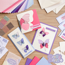 Load image into Gallery viewer, Three iris fold butterfly cards in pink, blue and purple
