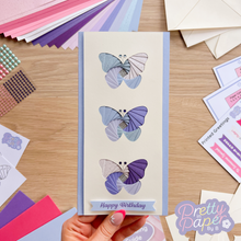 Load image into Gallery viewer, Trio of butterflies iris folding card in blue colours
