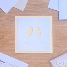 Load image into Gallery viewer, A cut-out of two champagne glasses on  a cream card blank 
