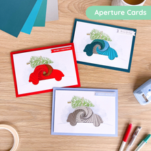 Load image into Gallery viewer, Christmas Car Printed Aperture Card Pack. Three greeting cards made with the pack
