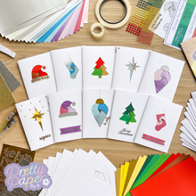 Load image into Gallery viewer, Ten iris fold christmas cards made with the Christmas Collection kit

