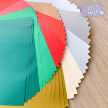 Load image into Gallery viewer, Christmas Paper Pack A5, 60 Sheets | Plain, Pearlised &amp; Sparkle Paper Pad | Red Green Gold Silver Craft Paper
