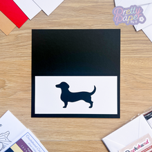 Load image into Gallery viewer, Dachshund Aperture on black card blank
