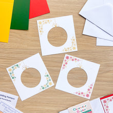 Load image into Gallery viewer, *New Revised Edition* Decorative Bauble Aperture Card (Pack of 3) | 3 x Square White Decorated Round Apertures, Coloured Card Blanks &amp; White Envelopes
