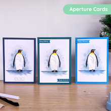 Load image into Gallery viewer, Emperor Penguin Printed Aperture Card Pack - three iris fold greeting cards made with the pack
