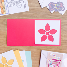 Load image into Gallery viewer, Flower petals aperture on pink card
