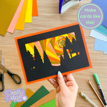 Load image into Gallery viewer, Iris Fold Forest Silhouette on orange card
