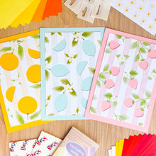 Load image into Gallery viewer, Kit contents displayed to show the apertures, cards, papers and embellishments
