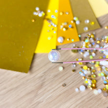 Load image into Gallery viewer, Close up of a crystal gem embellishment
