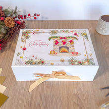 Load image into Gallery viewer, Decorative Christmas box with a fireplace design on a wooden surface.

