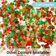 Load image into Gallery viewer, Shattered maple leaf confetti in red, green, and gold scattered on a light wood surface, with a blue 'Craft Supplies' label at the top right and 'Other Colours Available' text at the bottom.
