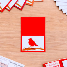Load image into Gallery viewer, Bright red card blank with a mini robin card cutout.
