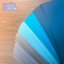 Load image into Gallery viewer, 60 sheets of Teal, Blue, Silver A5 papers
