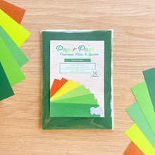 Load image into Gallery viewer, A pack of 30 craft paper sheets in the 'Rainforest' color range. The product is displayed on a light wood background with additional paper sheets fanned out on the sides.
