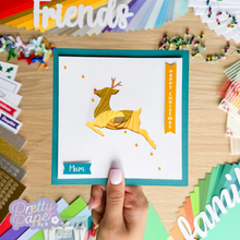 Load image into Gallery viewer, Gold iris fold reindeer on teal card
