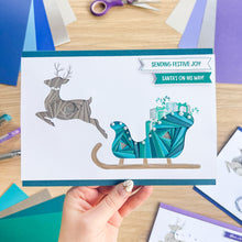 Load image into Gallery viewer, Santa&#39;s Sleigh with Reindeer Aperture Card (Pack of 3) | 3 x Square PRINTED Christmas Apertures, Coloured Card Blanks &amp; White Envelopes | Night Sky Edition | Blue Purple Teal
